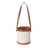 Contrasting canvas-paneled bucket shoulder bag