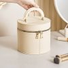 Portable waterproof hand-held cosmetic bag for business trip