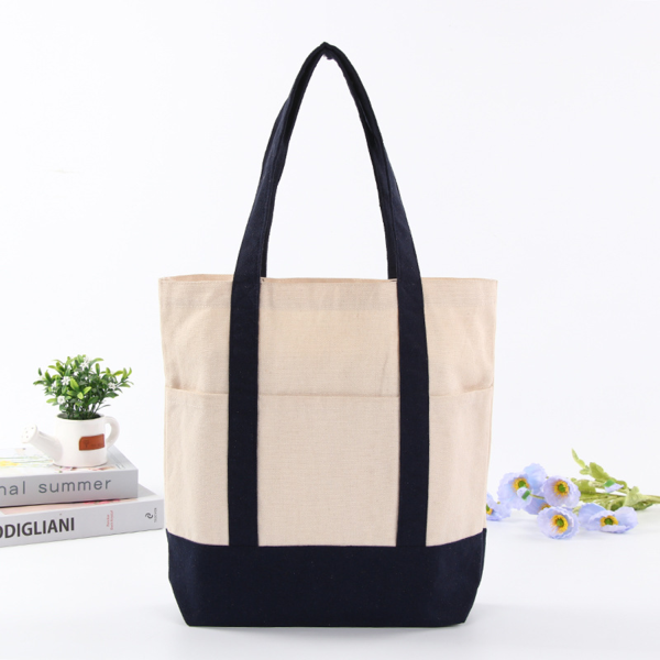 88bc9c6f-734c-42ab-afff-e4ede24000cd_3.png Daily Essentials Canvas Tote Bag With An External Pocket
