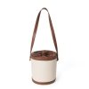 Contrasting canvas-paneled bucket shoulder bag