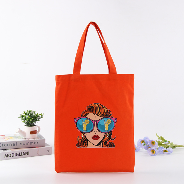 dc1dcbe1-e74a-4b3d-9e83-fc5eb08d3a02_1.png Daily Essentials Canvas Tote Bag With An External Pocket