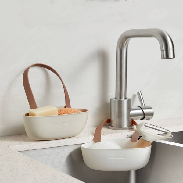 Sink hanging basket with water outlet