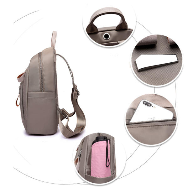 127_1761577774736.png Waterproof Oxford Backpack W/ Pendant