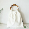 528包白色_1779952690786.png Tie Dye Canvas Bamboo Handle Handbag